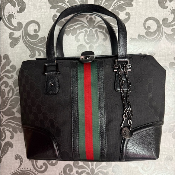 Gucci Handbags - Gucci - Vintage Boston Satchel. Black canvas with leather accents.